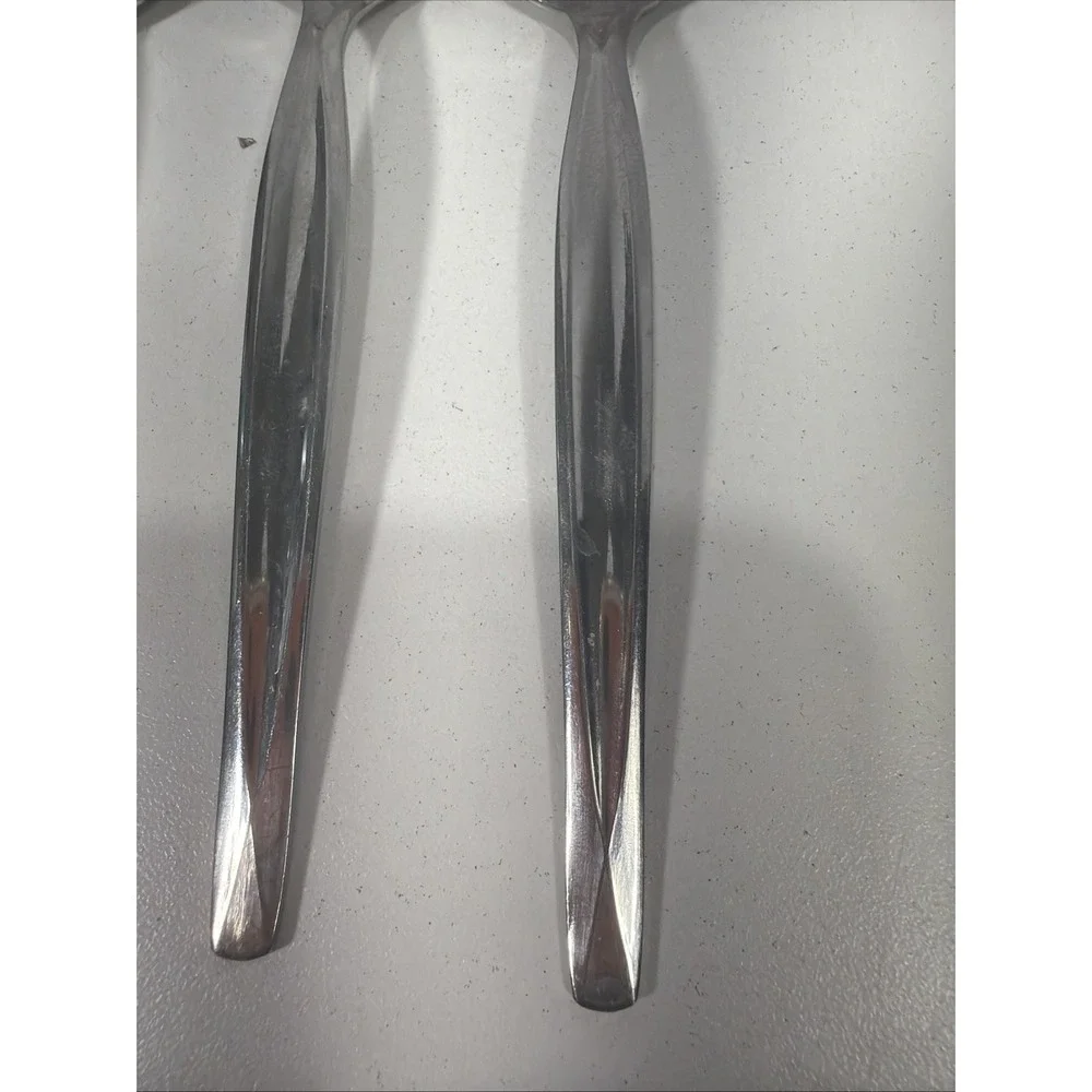 5pc. lot of Vintage Wm. Rogers & Son Serrated Spoon